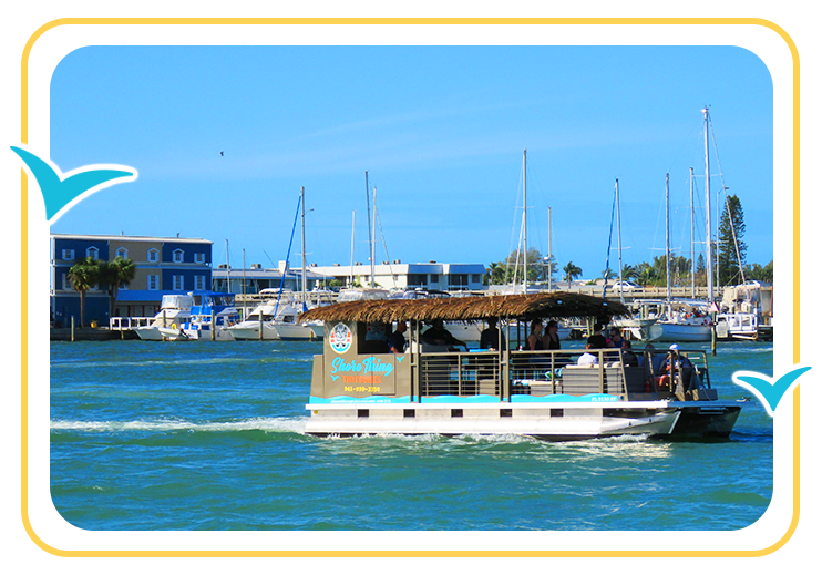 Shore Thing Tiki Cruises boat in harbor